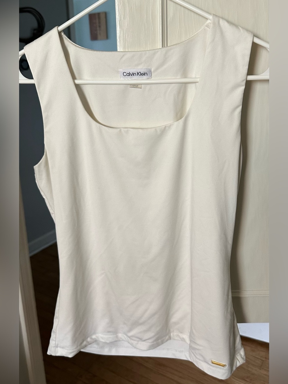 Calvin Klein Square Neck Sleeveless blouse.